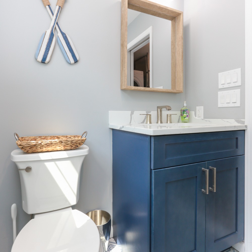 Bathroom remodel with subway tile and matte fixtures