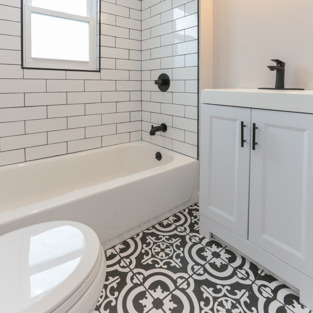 Bathroom remodel with custom vanity and stone countertop