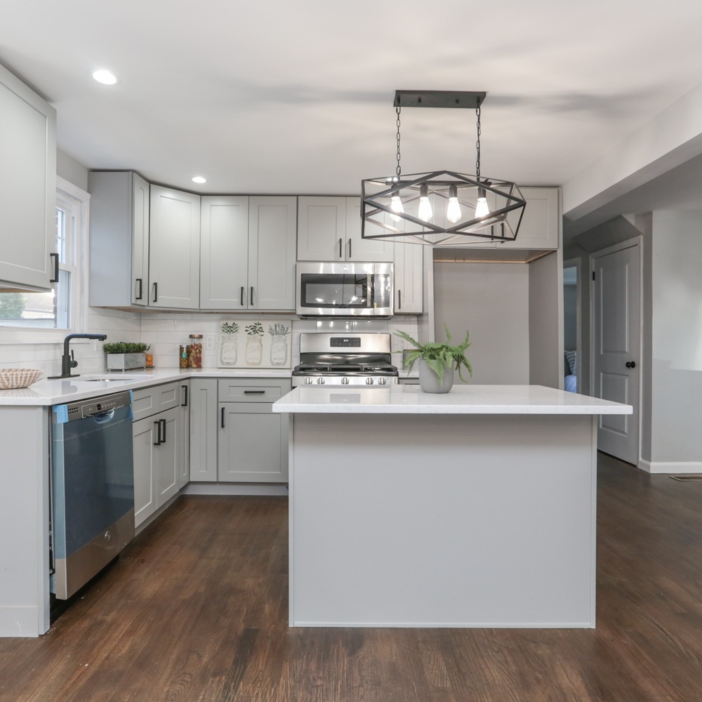 Full kitchen renovation with marble accents